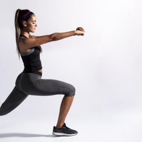 medium shot woman stretching with copy space 23 2148267333